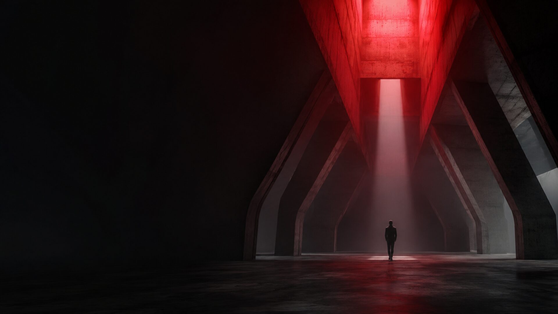 Architectural interior with red accent lighting and a human silhouette